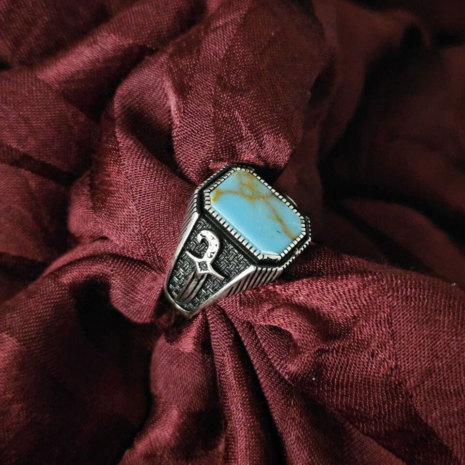 Kılıç işlemeli 925 Ayar taşlı Gümüş Yüzük